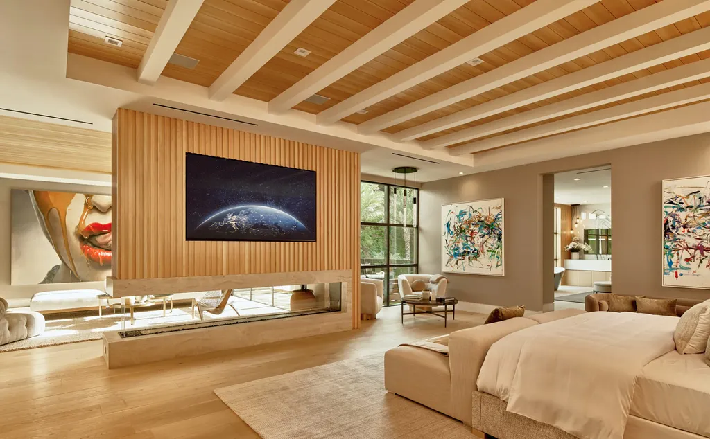 13187 Chalon Road Home in Los Angeles, California. Embrace the epitome of modern luxury living at Allure, a stunning estate designed by award-winning Developer Ramtin Ray Nosrati. Set on 1.3 acres of picturesque California landscape, this idyllic paradise offers resort-quality amenities including a pickleball court, a professional-size basketball/sports court, putting green, and more. 