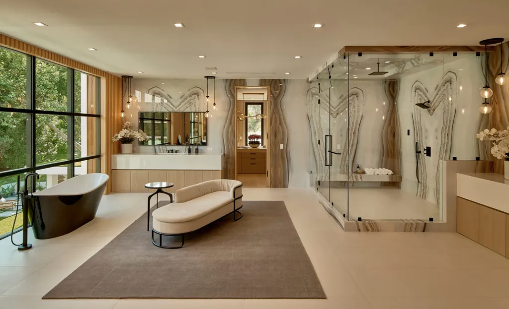 13187 Chalon Road Home in Los Angeles, California. Embrace the epitome of modern luxury living at Allure, a stunning estate designed by award-winning Developer Ramtin Ray Nosrati. Set on 1.3 acres of picturesque California landscape, this idyllic paradise offers resort-quality amenities including a pickleball court, a professional-size basketball/sports court, putting green, and more. 