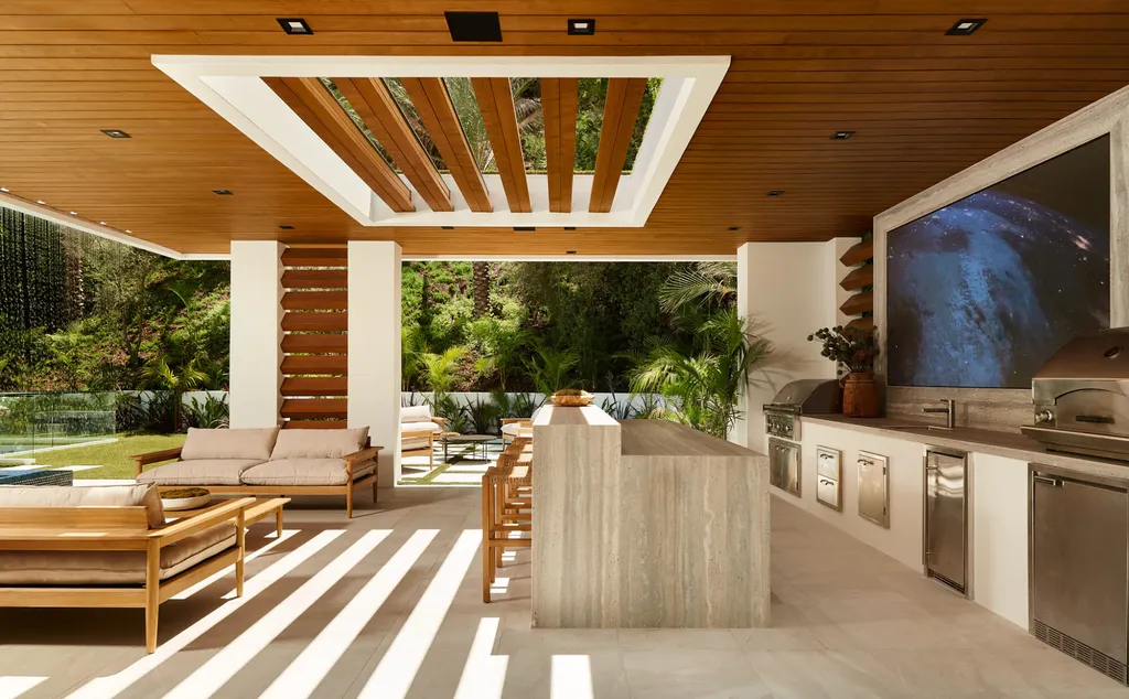13187 Chalon Road Home in Los Angeles, California. Embrace the epitome of modern luxury living at Allure, a stunning estate designed by award-winning Developer Ramtin Ray Nosrati. Set on 1.3 acres of picturesque California landscape, this idyllic paradise offers resort-quality amenities including a pickleball court, a professional-size basketball/sports court, putting green, and more. 