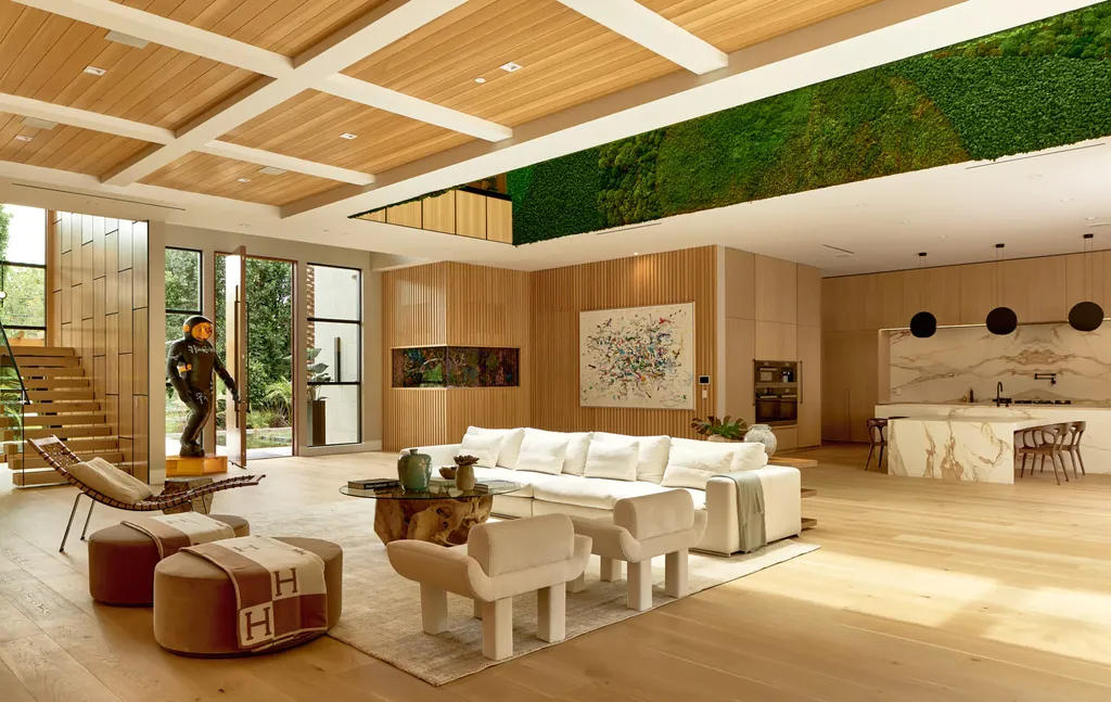 13187 Chalon Road Home in Los Angeles, California. Embrace the epitome of modern luxury living at Allure, a stunning estate designed by award-winning Developer Ramtin Ray Nosrati. Set on 1.3 acres of picturesque California landscape, this idyllic paradise offers resort-quality amenities including a pickleball court, a professional-size basketball/sports court, putting green, and more. 