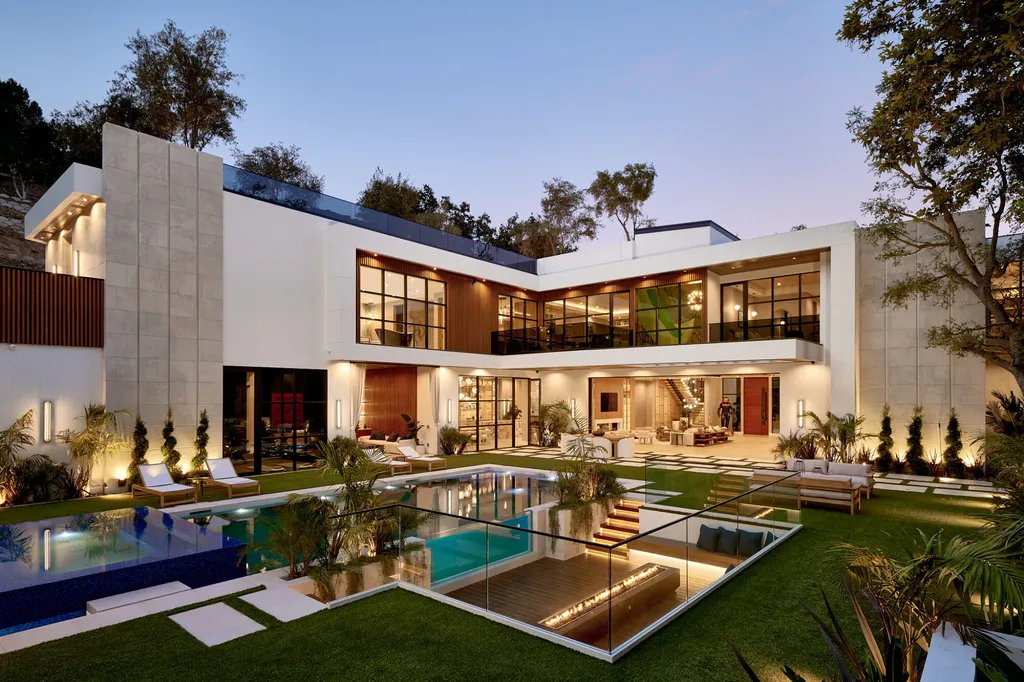 13187 Chalon Road Home in Los Angeles, California. Embrace the epitome of modern luxury living at Allure, a stunning estate designed by award-winning Developer Ramtin Ray Nosrati. Set on 1.3 acres of picturesque California landscape, this idyllic paradise offers resort-quality amenities including a pickleball court, a professional-size basketball/sports court, putting green, and more. 