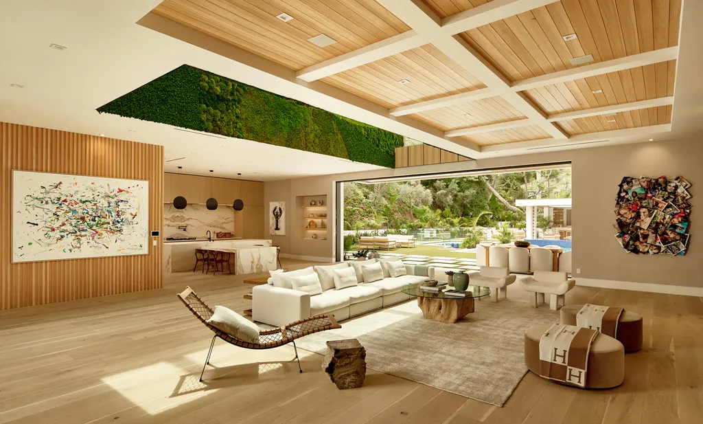 13187 Chalon Road Home in Los Angeles, California. Embrace the epitome of modern luxury living at Allure, a stunning estate designed by award-winning Developer Ramtin Ray Nosrati. Set on 1.3 acres of picturesque California landscape, this idyllic paradise offers resort-quality amenities including a pickleball court, a professional-size basketball/sports court, putting green, and more. 