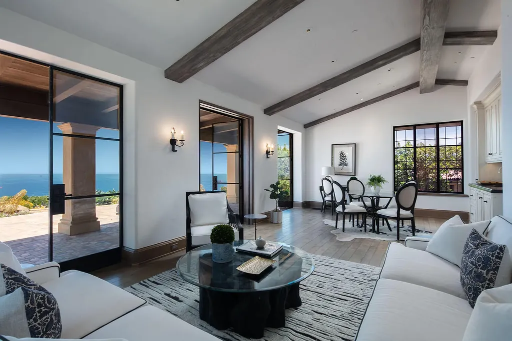 13600 Calle Real Home in Goleta, California. Escape to the enchanting Villa Del Mare, a blend of Old California charm and modern luxury on 287 acres near Refugio State Beach. With panoramic views of the coastline and foothills, this one-level estate offers 5 en suite bedrooms, spacious entertainment areas, a private helipad, and sustainable features like solar power and private water sources.