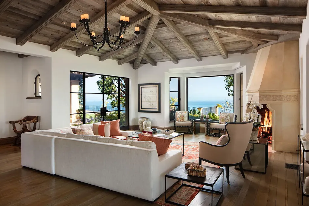 13600 Calle Real Home in Goleta, California. Escape to the enchanting Villa Del Mare, a blend of Old California charm and modern luxury on 287 acres near Refugio State Beach. With panoramic views of the coastline and foothills, this one-level estate offers 5 en suite bedrooms, spacious entertainment areas, a private helipad, and sustainable features like solar power and private water sources.