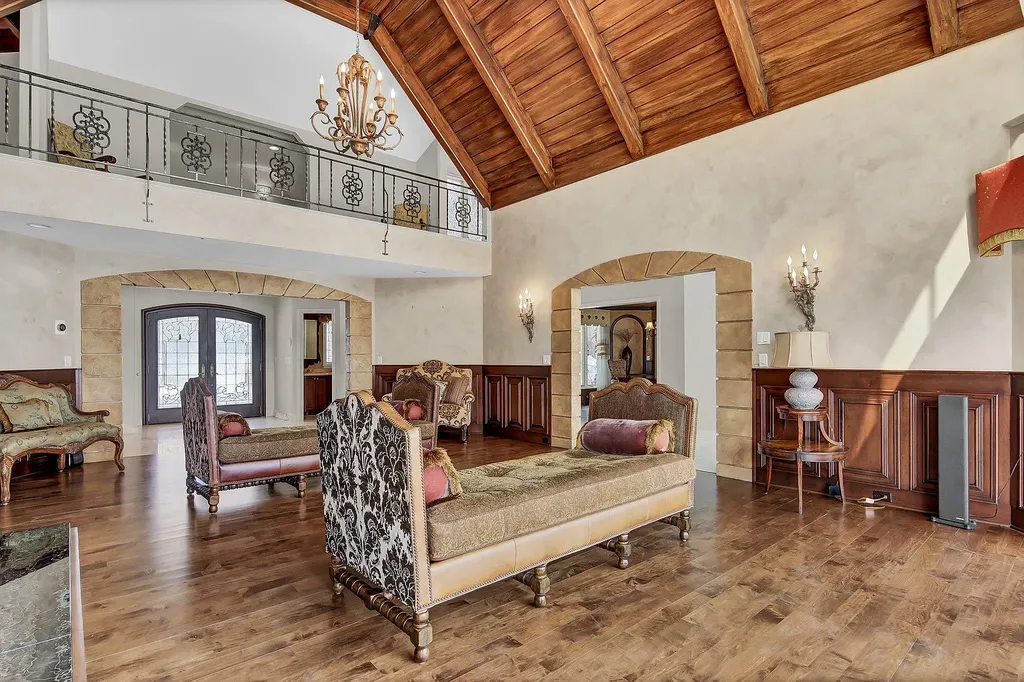 16 Evergreen Road Home in North Oaks, Minnesota. Experience luxury living at its finest in this exceptional estate nestled within the esteemed North Oaks Community, situated on the original James J. Hill Homestead. This remarkable property offers a plethora of outstanding features, including an awe-inspiring pool area adorned with fountains, lights, hidden waterproof speakers, a jacuzzi, and even an indoor sauna.