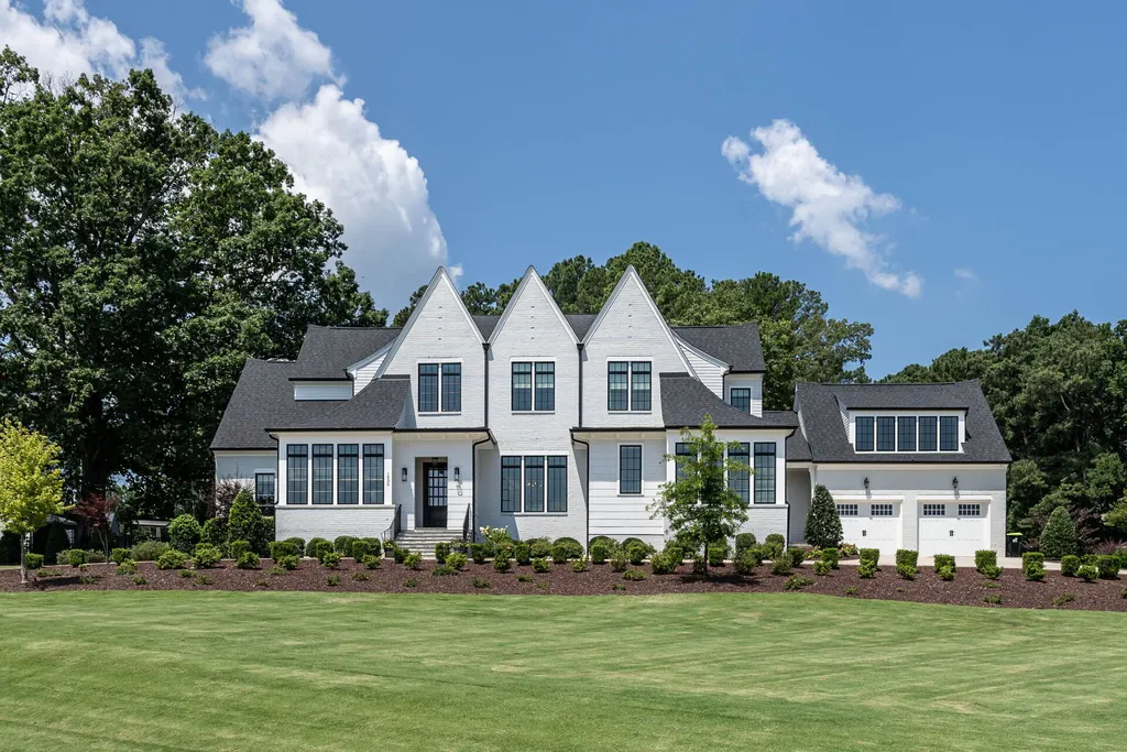 1632 Estate Valley Lane Home in Raleigh, North Carolina. Step into a realm where the pressures of daily life dissolve into the serene blue depths of the pool. Experience daily pampering while engaging in ordinary activities. This impeccable residence seamlessly blends the finest aspects of living, incorporating design and upgrades that effortlessly enhance ease and comfort. 