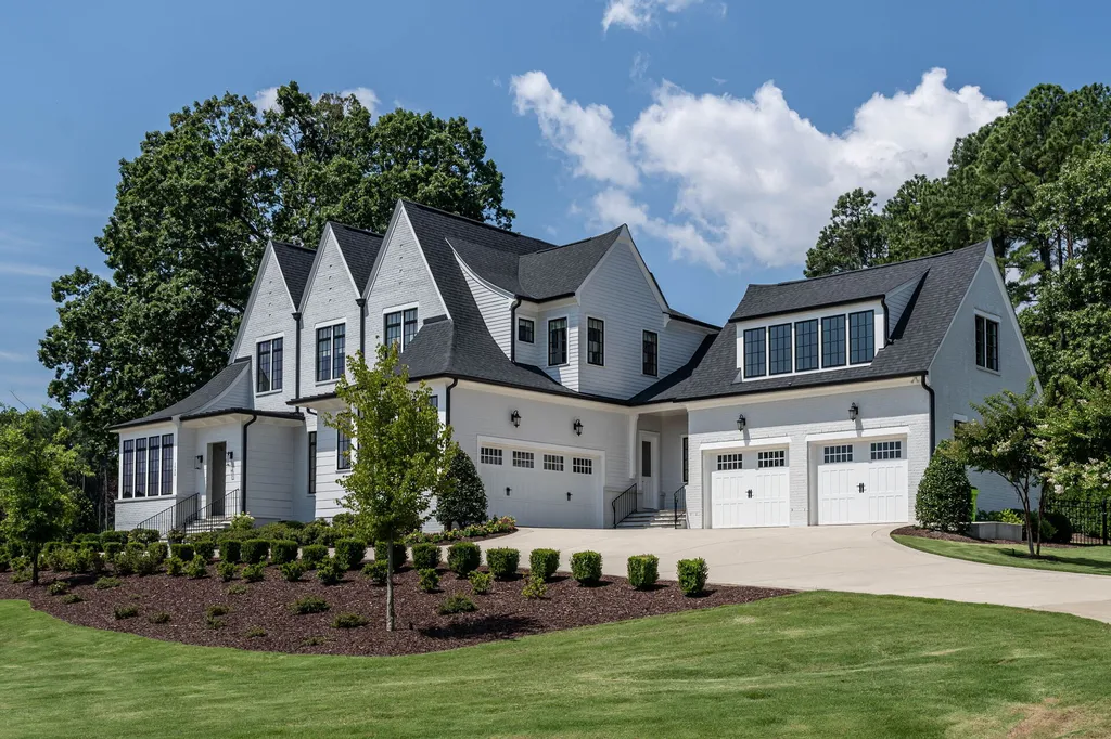 1632 Estate Valley Lane Home in Raleigh, North Carolina. Step into a realm where the pressures of daily life dissolve into the serene blue depths of the pool. Experience daily pampering while engaging in ordinary activities. This impeccable residence seamlessly blends the finest aspects of living, incorporating design and upgrades that effortlessly enhance ease and comfort. 