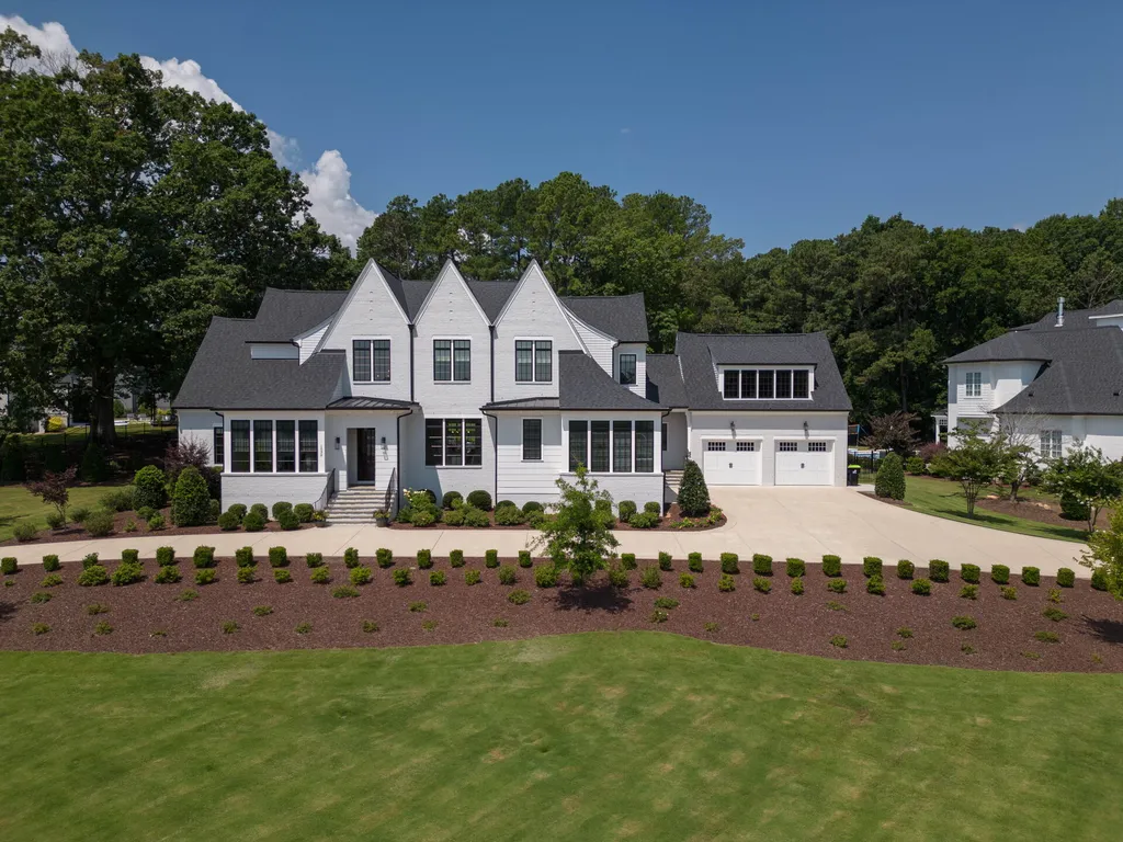 1632 Estate Valley Lane Home in Raleigh, North Carolina. Step into a realm where the pressures of daily life dissolve into the serene blue depths of the pool. Experience daily pampering while engaging in ordinary activities. This impeccable residence seamlessly blends the finest aspects of living, incorporating design and upgrades that effortlessly enhance ease and comfort. 