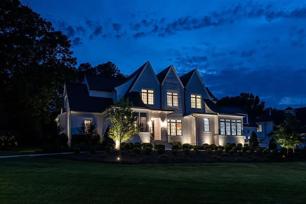 1632 Estate Valley Lane Home in Raleigh, North Carolina. Step into a realm where the pressures of daily life dissolve into the serene blue depths of the pool. Experience daily pampering while engaging in ordinary activities. This impeccable residence seamlessly blends the finest aspects of living, incorporating design and upgrades that effortlessly enhance ease and comfort. 