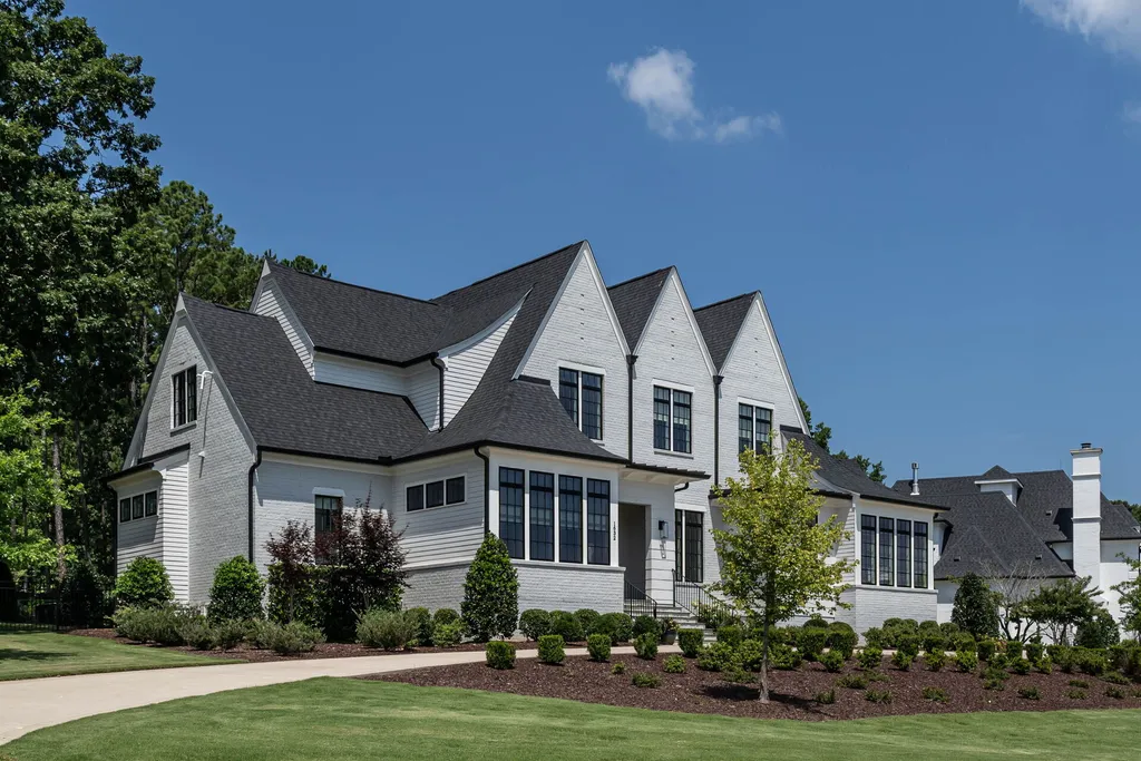 1632 Estate Valley Lane Home in Raleigh, North Carolina. Step into a realm where the pressures of daily life dissolve into the serene blue depths of the pool. Experience daily pampering while engaging in ordinary activities. This impeccable residence seamlessly blends the finest aspects of living, incorporating design and upgrades that effortlessly enhance ease and comfort. 