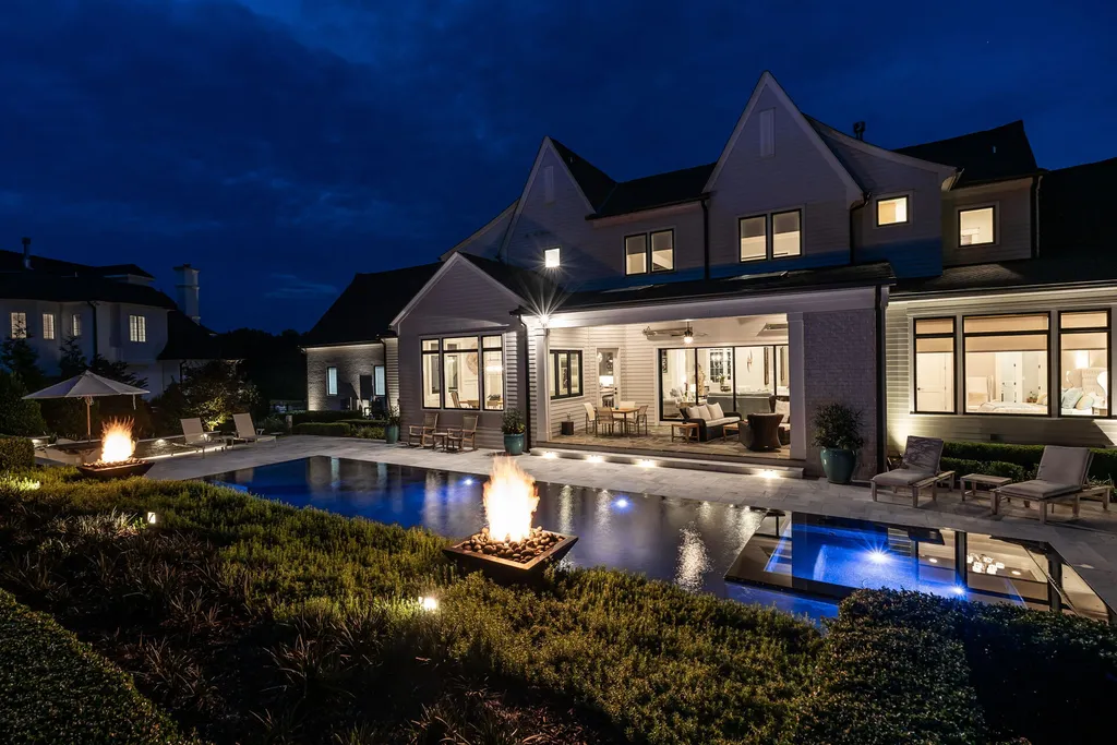 1632 Estate Valley Lane Home in Raleigh, North Carolina. Step into a realm where the pressures of daily life dissolve into the serene blue depths of the pool. Experience daily pampering while engaging in ordinary activities. This impeccable residence seamlessly blends the finest aspects of living, incorporating design and upgrades that effortlessly enhance ease and comfort. 