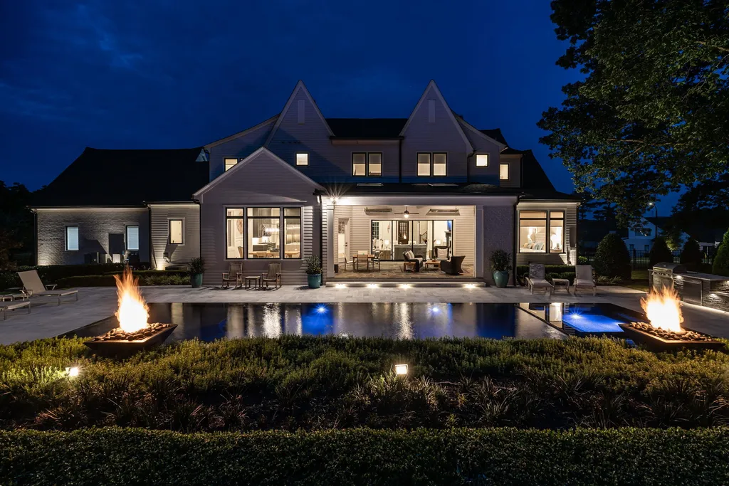 1632 Estate Valley Lane Home in Raleigh, North Carolina. Step into a realm where the pressures of daily life dissolve into the serene blue depths of the pool. Experience daily pampering while engaging in ordinary activities. This impeccable residence seamlessly blends the finest aspects of living, incorporating design and upgrades that effortlessly enhance ease and comfort. 