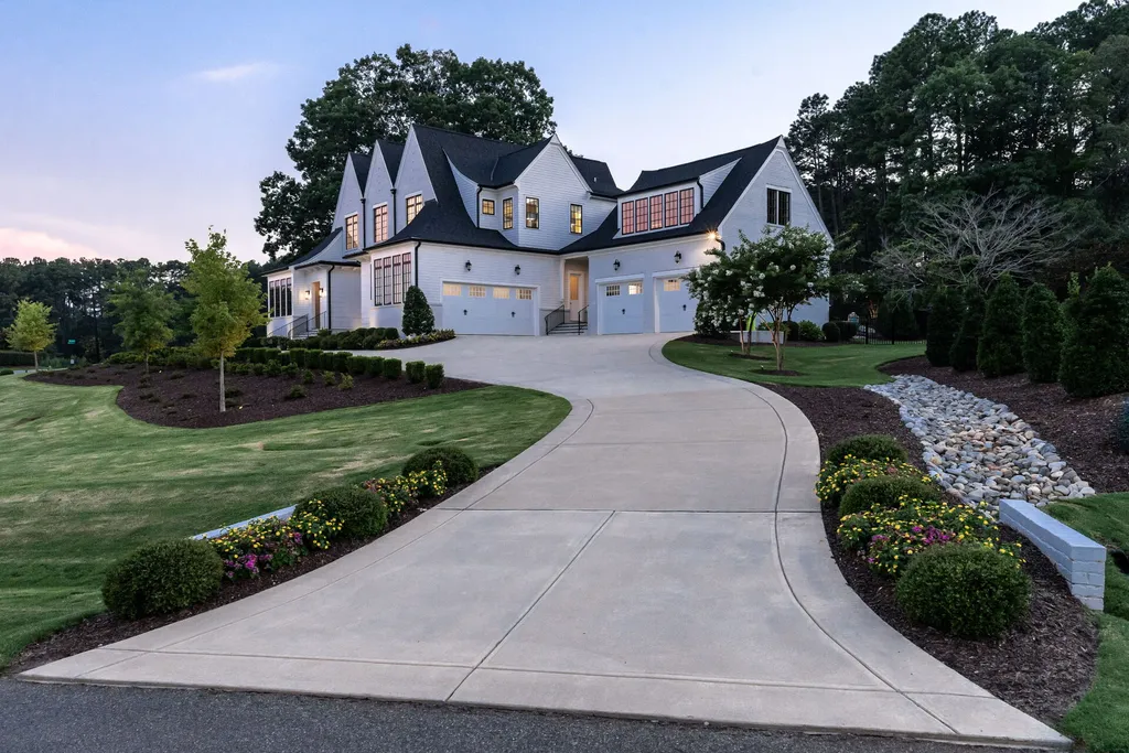 1632 Estate Valley Lane Home in Raleigh, North Carolina. Step into a realm where the pressures of daily life dissolve into the serene blue depths of the pool. Experience daily pampering while engaging in ordinary activities. This impeccable residence seamlessly blends the finest aspects of living, incorporating design and upgrades that effortlessly enhance ease and comfort. 