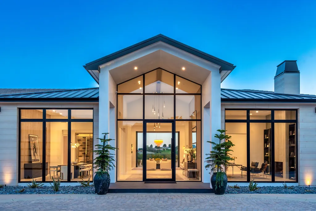 1856 Dawn Meadow Street Home in Thousand Oaks, California. Discover the pinnacle of luxury living in this newly constructed contemporary masterpiece nestled in North Ranch's High Country section. With 11,000 square feet of single-story opulence, this 6-bedroom, 9-bathroom home features a theater, wine wall, game room, and more. 
