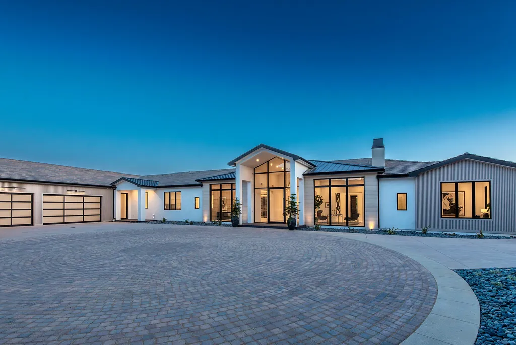 1856 Dawn Meadow Street Home in Thousand Oaks, California. Discover the pinnacle of luxury living in this newly constructed contemporary masterpiece nestled in North Ranch's High Country section. With 11,000 square feet of single-story opulence, this 6-bedroom, 9-bathroom home features a theater, wine wall, game room, and more. 