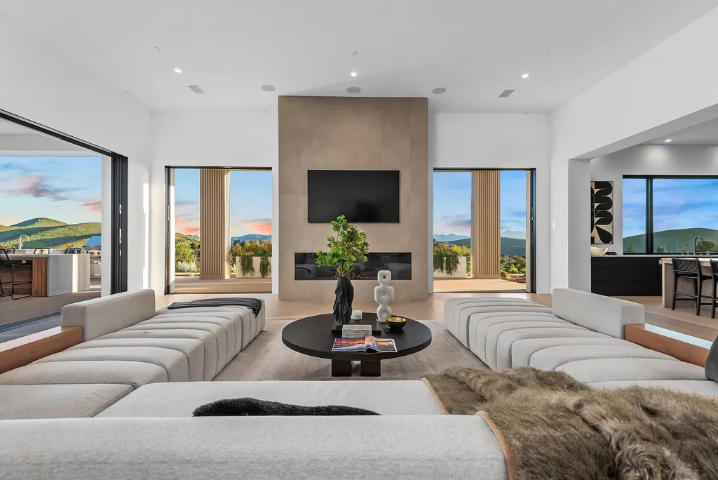 1856 Dawn Meadow Street Home in Thousand Oaks, California. Discover the pinnacle of luxury living in this newly constructed contemporary masterpiece nestled in North Ranch's High Country section. With 11,000 square feet of single-story opulence, this 6-bedroom, 9-bathroom home features a theater, wine wall, game room, and more. 