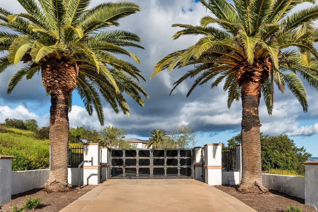 1856 Dawn Meadow Street Home in Thousand Oaks, California. Discover the pinnacle of luxury living in this newly constructed contemporary masterpiece nestled in North Ranch's High Country section. With 11,000 square feet of single-story opulence, this 6-bedroom, 9-bathroom home features a theater, wine wall, game room, and more. 