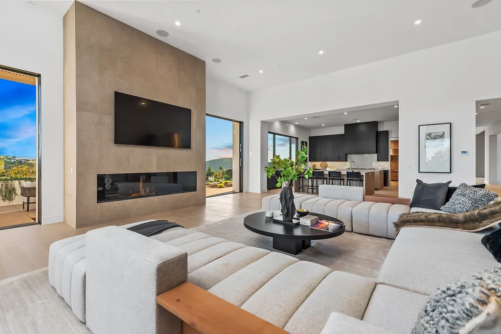 1856 Dawn Meadow Street Home in Thousand Oaks, California. Discover the pinnacle of luxury living in this newly constructed contemporary masterpiece nestled in North Ranch's High Country section. With 11,000 square feet of single-story opulence, this 6-bedroom, 9-bathroom home features a theater, wine wall, game room, and more. 