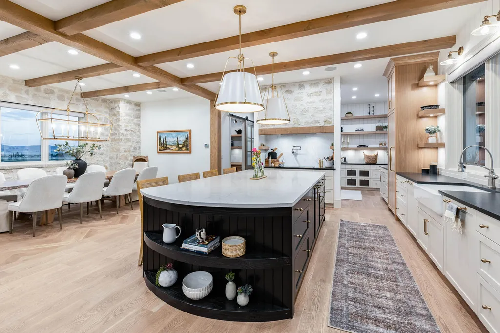 186 West Lazy Acres Lane Home in Kamas, Utah. Step into luxury living with this stunning 2022-built Park City Showcase home nestled on over 1.2 acres in Lazy Acres Ranch Estates. Crafted by Jana Gough Interiors and renowned Gough Contracting, this masterpiece offers exceptional finishes throughout.
