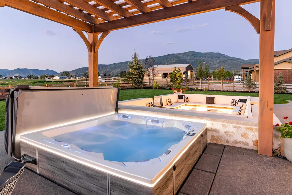 186 West Lazy Acres Lane Home in Kamas, Utah. Step into luxury living with this stunning 2022-built Park City Showcase home nestled on over 1.2 acres in Lazy Acres Ranch Estates. Crafted by Jana Gough Interiors and renowned Gough Contracting, this masterpiece offers exceptional finishes throughout.
