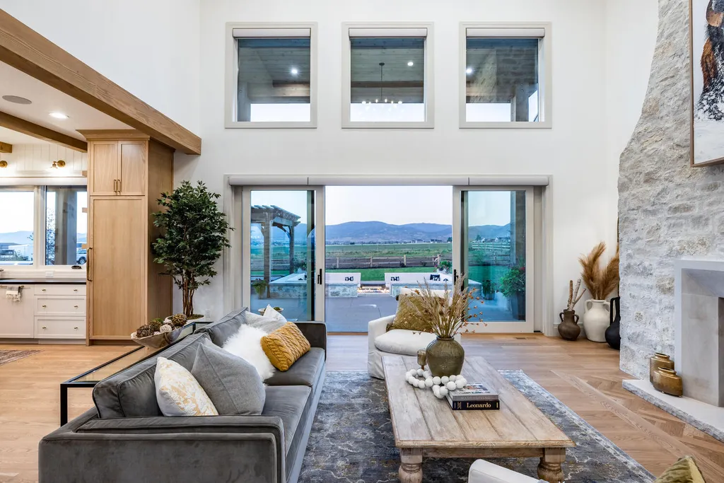 186 West Lazy Acres Lane Home in Kamas, Utah. Step into luxury living with this stunning 2022-built Park City Showcase home nestled on over 1.2 acres in Lazy Acres Ranch Estates. Crafted by Jana Gough Interiors and renowned Gough Contracting, this masterpiece offers exceptional finishes throughout.