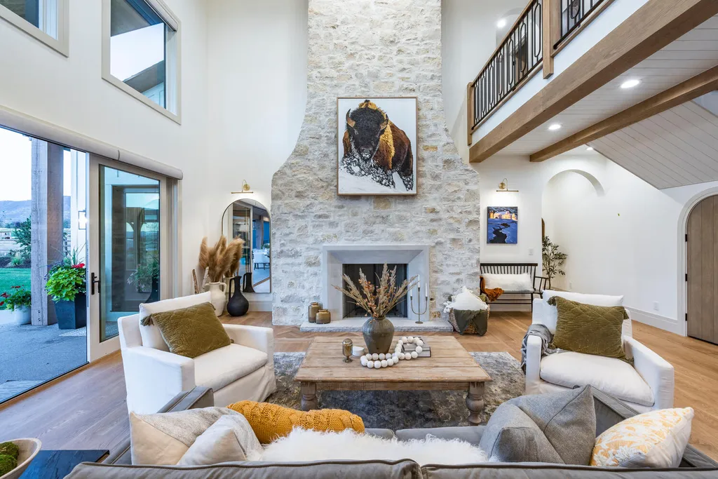 186 West Lazy Acres Lane Home in Kamas, Utah. Step into luxury living with this stunning 2022-built Park City Showcase home nestled on over 1.2 acres in Lazy Acres Ranch Estates. Crafted by Jana Gough Interiors and renowned Gough Contracting, this masterpiece offers exceptional finishes throughout.