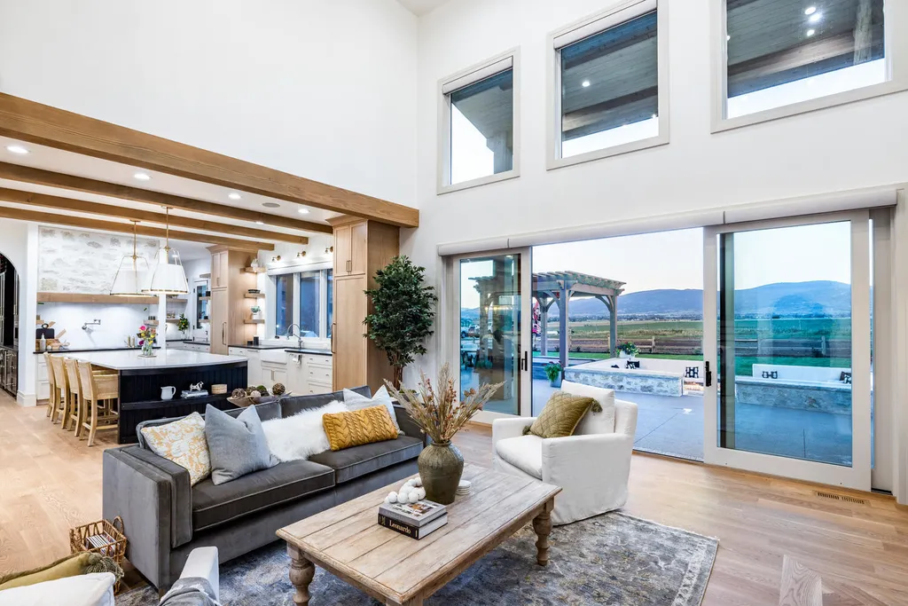 186 West Lazy Acres Lane Home in Kamas, Utah. Step into luxury living with this stunning 2022-built Park City Showcase home nestled on over 1.2 acres in Lazy Acres Ranch Estates. Crafted by Jana Gough Interiors and renowned Gough Contracting, this masterpiece offers exceptional finishes throughout.