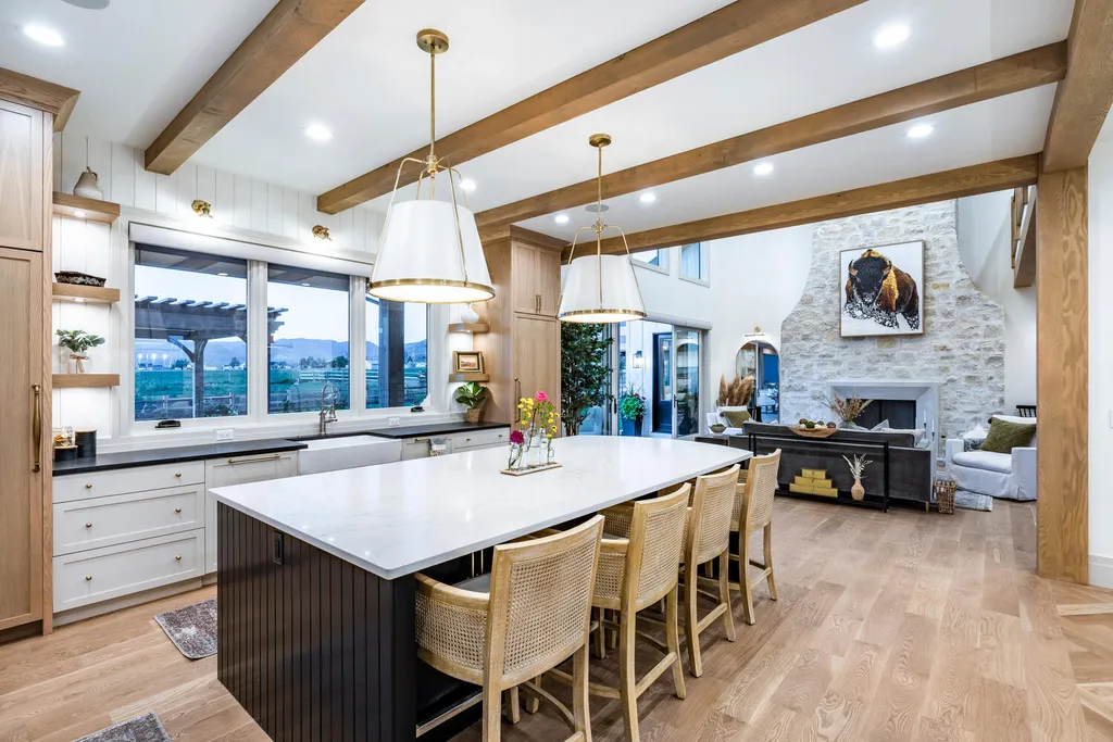 186 West Lazy Acres Lane Home in Kamas, Utah. Step into luxury living with this stunning 2022-built Park City Showcase home nestled on over 1.2 acres in Lazy Acres Ranch Estates. Crafted by Jana Gough Interiors and renowned Gough Contracting, this masterpiece offers exceptional finishes throughout.