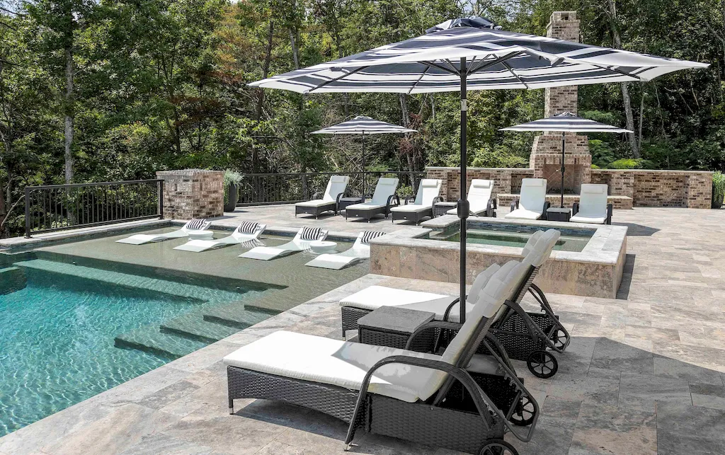 2050 Hidden Cove Lane Home in Knoxville, Tennessee. Welcome to your lakefront dream nestled in the coveted Choto area of West Knoxville! Tucked away at the end of a private road, this exceptional residence graces a tranquil cove, offering both seclusion and awe-inspiring water views. Recently constructed in 2021, this opulent estate seamlessly marries timeless elegance with contemporary refinement.