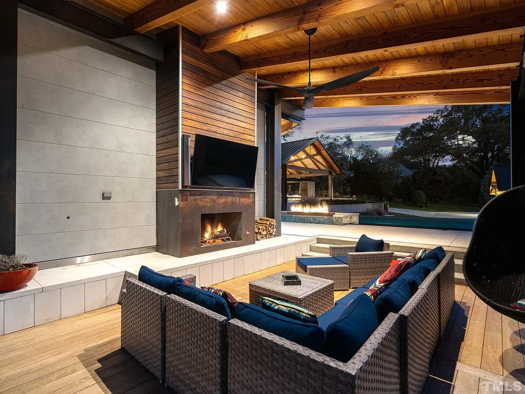 2315 Beechridge Road Home in Raleigh, North Carolina. Step into a modernist masterpiece where open living, natural light, and dramatic vaulted ceilings converge. This architectural gem is a true work of art, featuring a harmonious blend of unique natural woods, contemporary materials, and expansive windows. Discover a sanctuary of tranquility and design, nestled on an acre plus lot in Raleigh's sought-after legacy neighborhood.