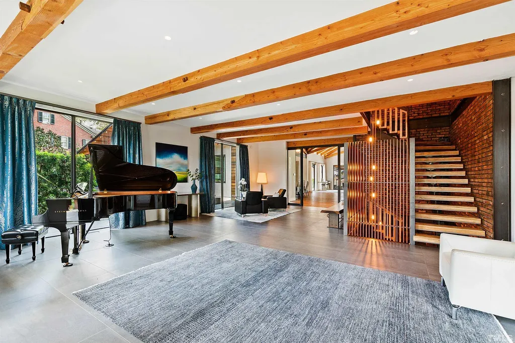2315 Beechridge Road Home in Raleigh, North Carolina. Step into a modernist masterpiece where open living, natural light, and dramatic vaulted ceilings converge. This architectural gem is a true work of art, featuring a harmonious blend of unique natural woods, contemporary materials, and expansive windows. Discover a sanctuary of tranquility and design, nestled on an acre plus lot in Raleigh's sought-after legacy neighborhood.