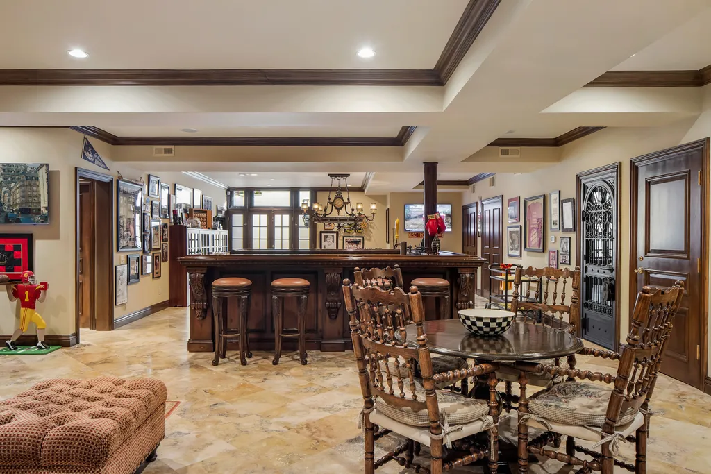 240 West Stafford Road Home in Thousand Oaks, California. This luxurious estate is located in the guard-gated community of Sherwood Country Club, just minutes from acclaimed schools, shopping, and fine dining. The home is adjacent to Hole 11 Island Green on the Jack Nicklaus-designed championship golf course and offers stunning views of the course and the surrounding area.