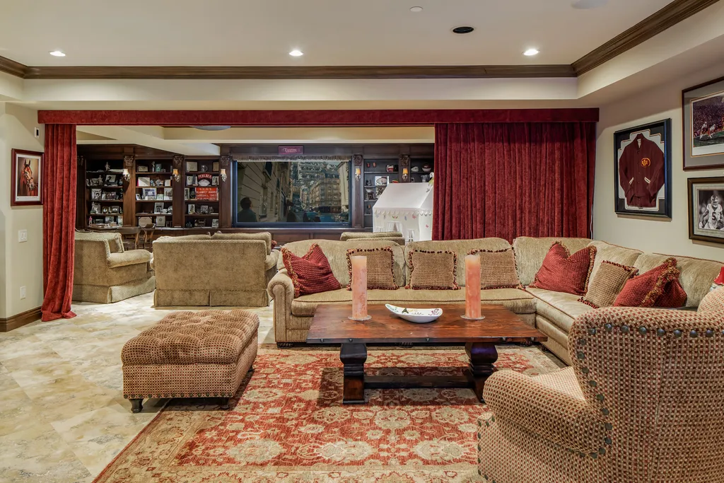 240 West Stafford Road Home in Thousand Oaks, California. This luxurious estate is located in the guard-gated community of Sherwood Country Club, just minutes from acclaimed schools, shopping, and fine dining. The home is adjacent to Hole 11 Island Green on the Jack Nicklaus-designed championship golf course and offers stunning views of the course and the surrounding area.