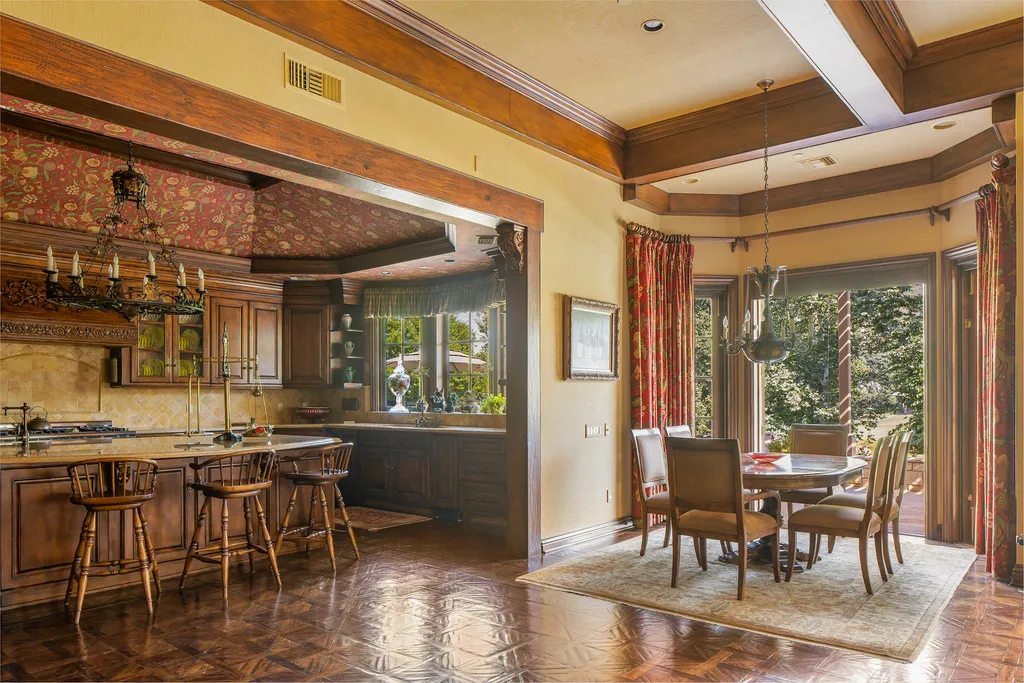 240 West Stafford Road Home in Thousand Oaks, California. This luxurious estate is located in the guard-gated community of Sherwood Country Club, just minutes from acclaimed schools, shopping, and fine dining. The home is adjacent to Hole 11 Island Green on the Jack Nicklaus-designed championship golf course and offers stunning views of the course and the surrounding area.