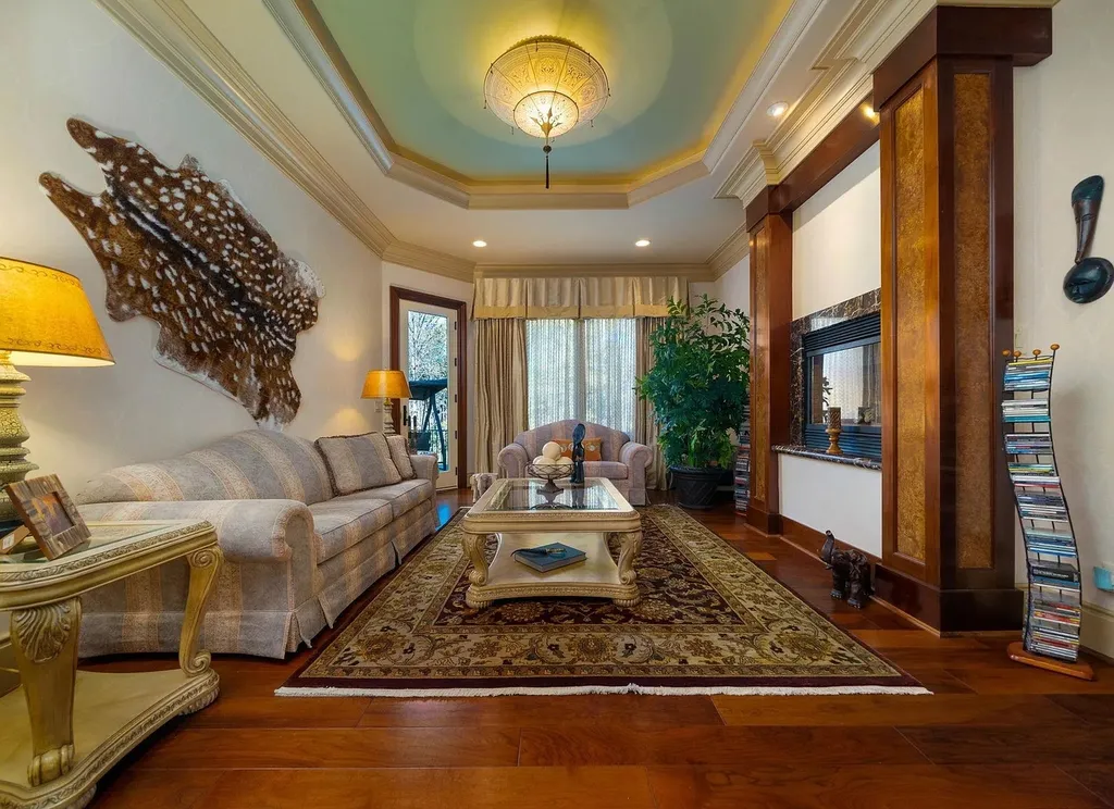 2421 Acanthus Drive Home in Wake Forest, North Carolina. Step into the world of luxury with this exceptional gated estate located in the Back Nine, featured in the Parade of Homes. Spanning 14,438 sqft, this masterfully crafted home boasts 6 bedrooms, 9 bathrooms, and lavish finishes throughout. Enjoy the grand foyer, two kitchens, theater room, wine cellar, and exercise room.