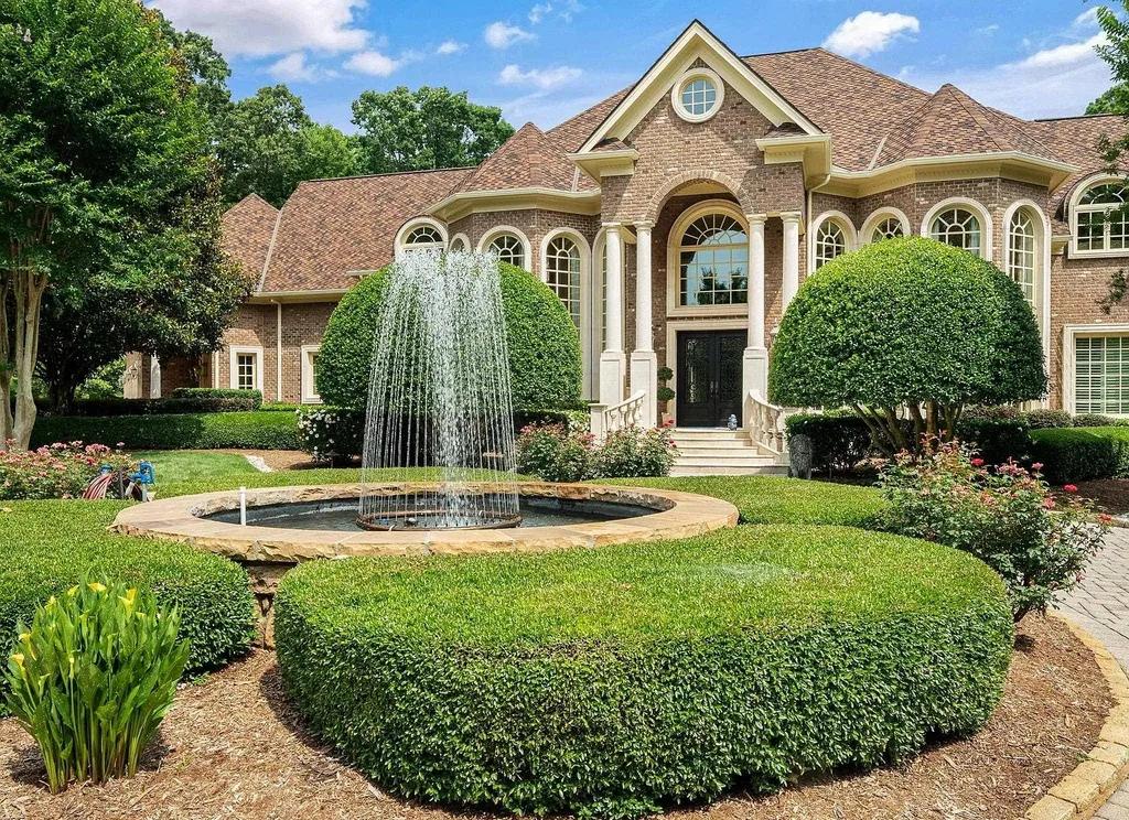 2421 Acanthus Drive Home in Wake Forest, North Carolina. Step into the world of luxury with this exceptional gated estate located in the Back Nine, featured in the Parade of Homes. Spanning 14,438 sqft, this masterfully crafted home boasts 6 bedrooms, 9 bathrooms, and lavish finishes throughout. Enjoy the grand foyer, two kitchens, theater room, wine cellar, and exercise room.