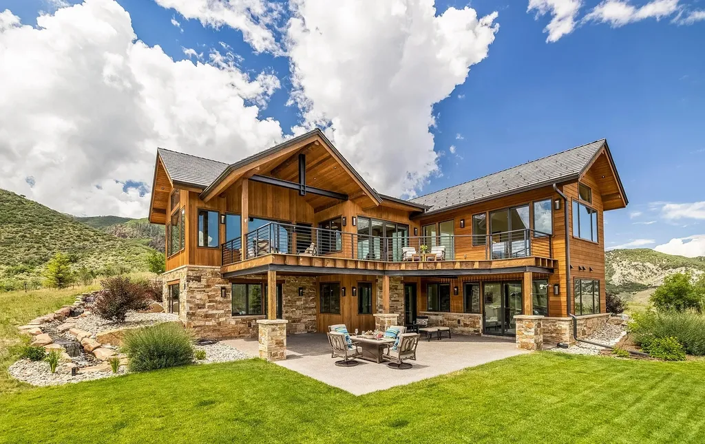 2445 Frost Creek Drive Home in Eagle, Colorado. Discover the epitome of elegant mountain living in this custom-designed Frost Creek home. Perched on the highest point, this exquisite residence offers 360-degree views of the private Club of Frost Creek and Brush Creek Valley.
