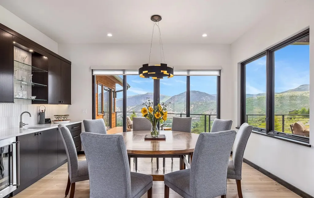 2445 Frost Creek Drive Home in Eagle, Colorado. Discover the epitome of elegant mountain living in this custom-designed Frost Creek home. Perched on the highest point, this exquisite residence offers 360-degree views of the private Club of Frost Creek and Brush Creek Valley.