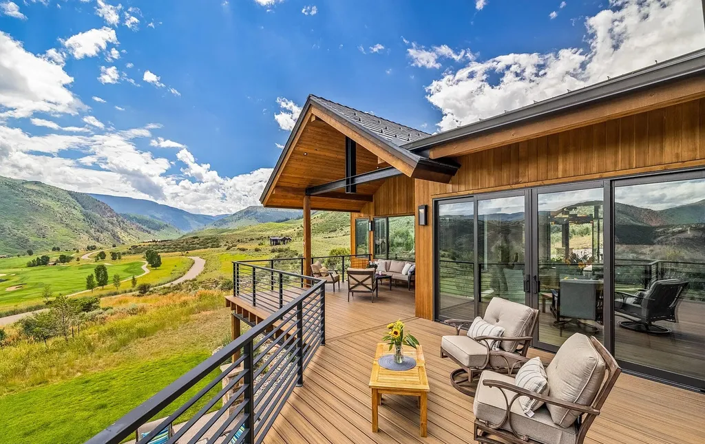 2445 Frost Creek Drive Home in Eagle, Colorado. Discover the epitome of elegant mountain living in this custom-designed Frost Creek home. Perched on the highest point, this exquisite residence offers 360-degree views of the private Club of Frost Creek and Brush Creek Valley.