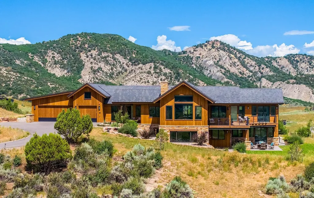 2445 Frost Creek Drive Home in Eagle, Colorado. Discover the epitome of elegant mountain living in this custom-designed Frost Creek home. Perched on the highest point, this exquisite residence offers 360-degree views of the private Club of Frost Creek and Brush Creek Valley.