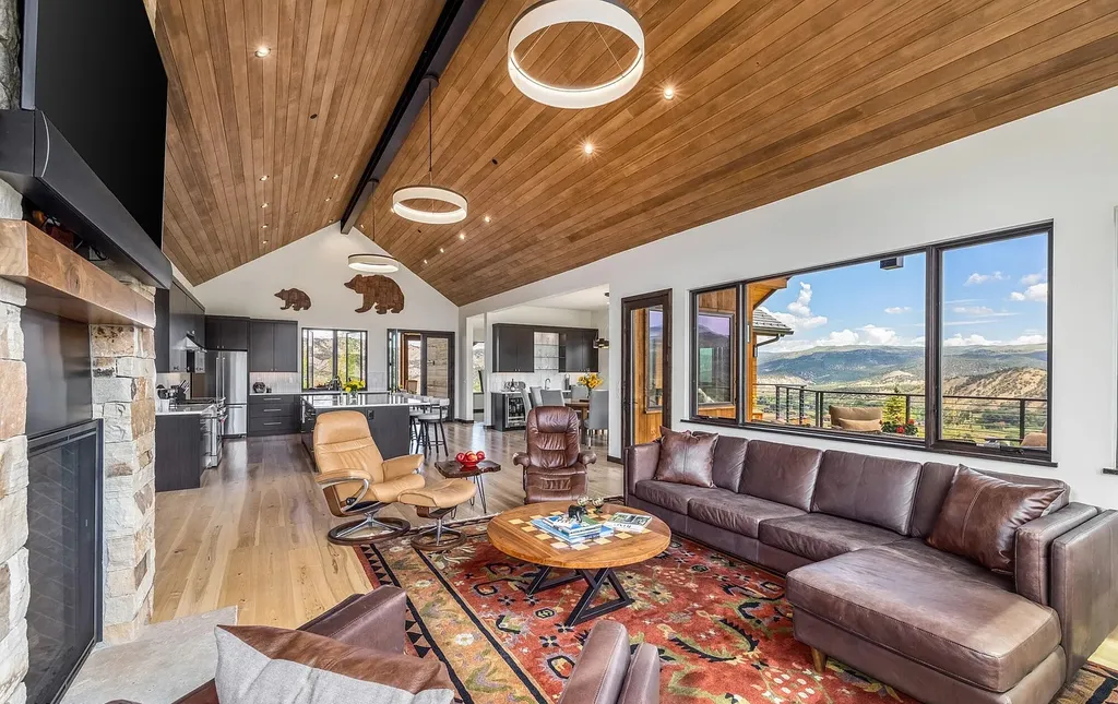 2445 Frost Creek Drive Home in Eagle, Colorado. Discover the epitome of elegant mountain living in this custom-designed Frost Creek home. Perched on the highest point, this exquisite residence offers 360-degree views of the private Club of Frost Creek and Brush Creek Valley.
