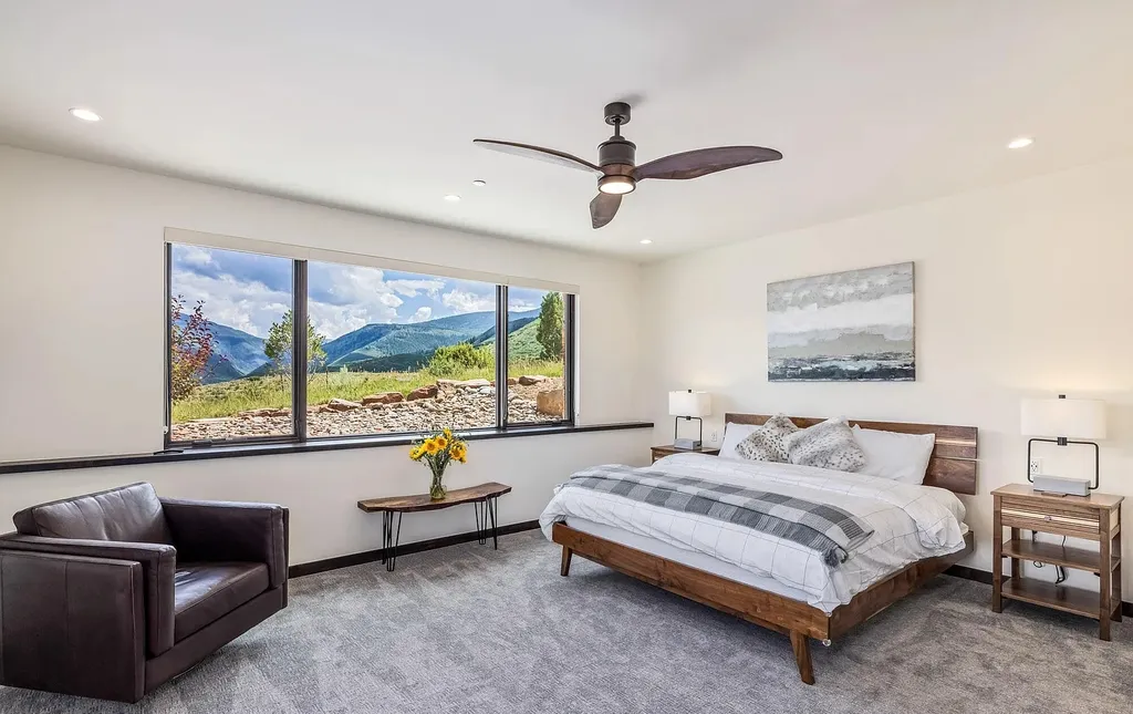 2445 Frost Creek Drive Home in Eagle, Colorado. Discover the epitome of elegant mountain living in this custom-designed Frost Creek home. Perched on the highest point, this exquisite residence offers 360-degree views of the private Club of Frost Creek and Brush Creek Valley.