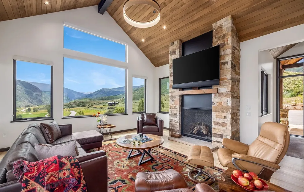 2445 Frost Creek Drive Home in Eagle, Colorado. Discover the epitome of elegant mountain living in this custom-designed Frost Creek home. Perched on the highest point, this exquisite residence offers 360-degree views of the private Club of Frost Creek and Brush Creek Valley.