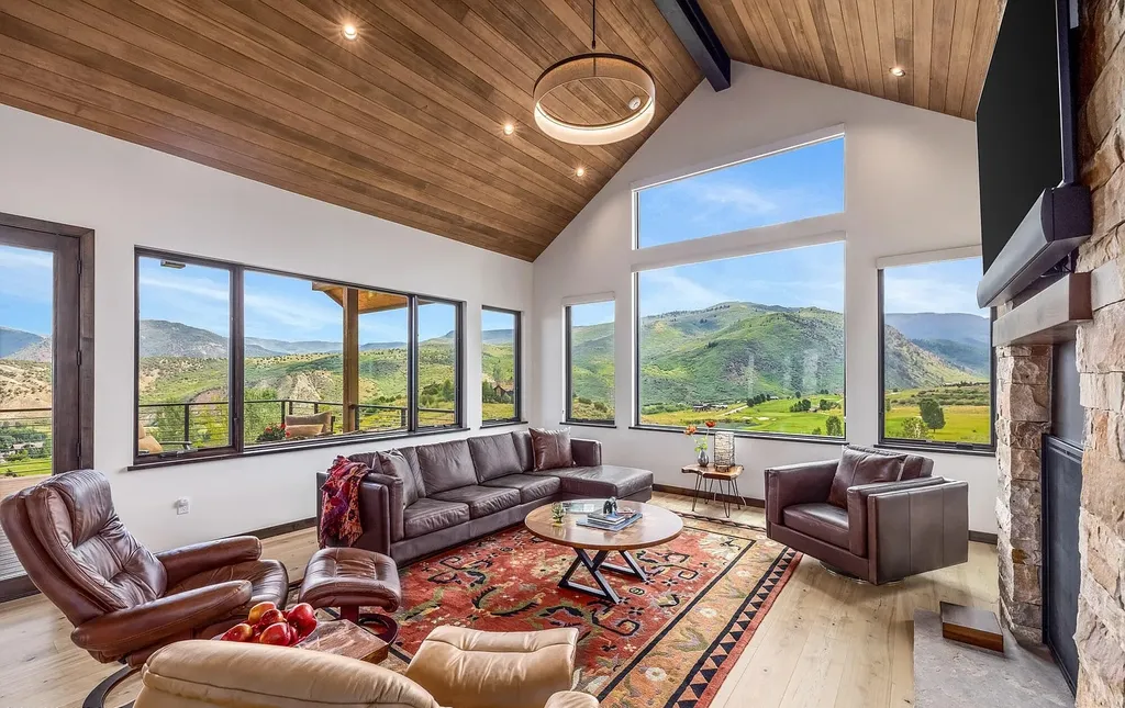 2445 Frost Creek Drive Home in Eagle, Colorado. Discover the epitome of elegant mountain living in this custom-designed Frost Creek home. Perched on the highest point, this exquisite residence offers 360-degree views of the private Club of Frost Creek and Brush Creek Valley.