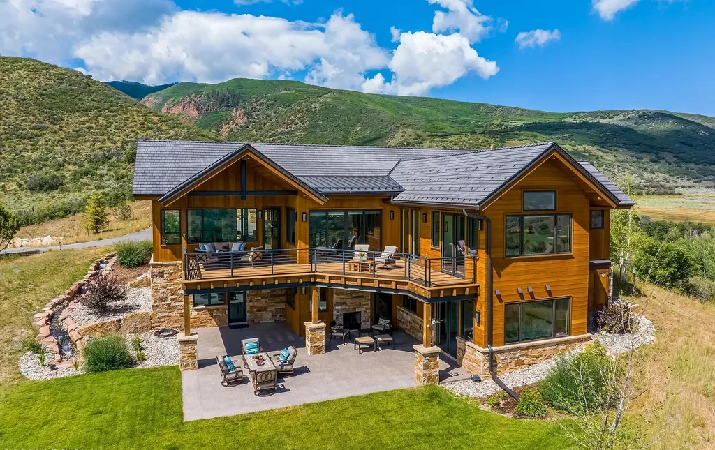 2445 Frost Creek Drive Home in Eagle, Colorado. Discover the epitome of elegant mountain living in this custom-designed Frost Creek home. Perched on the highest point, this exquisite residence offers 360-degree views of the private Club of Frost Creek and Brush Creek Valley.