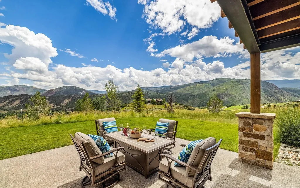 2445 Frost Creek Drive Home in Eagle, Colorado. Discover the epitome of elegant mountain living in this custom-designed Frost Creek home. Perched on the highest point, this exquisite residence offers 360-degree views of the private Club of Frost Creek and Brush Creek Valley.