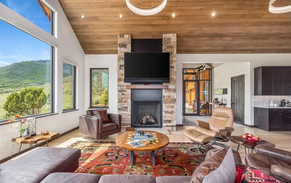 2445 Frost Creek Drive Home in Eagle, Colorado. Discover the epitome of elegant mountain living in this custom-designed Frost Creek home. Perched on the highest point, this exquisite residence offers 360-degree views of the private Club of Frost Creek and Brush Creek Valley.