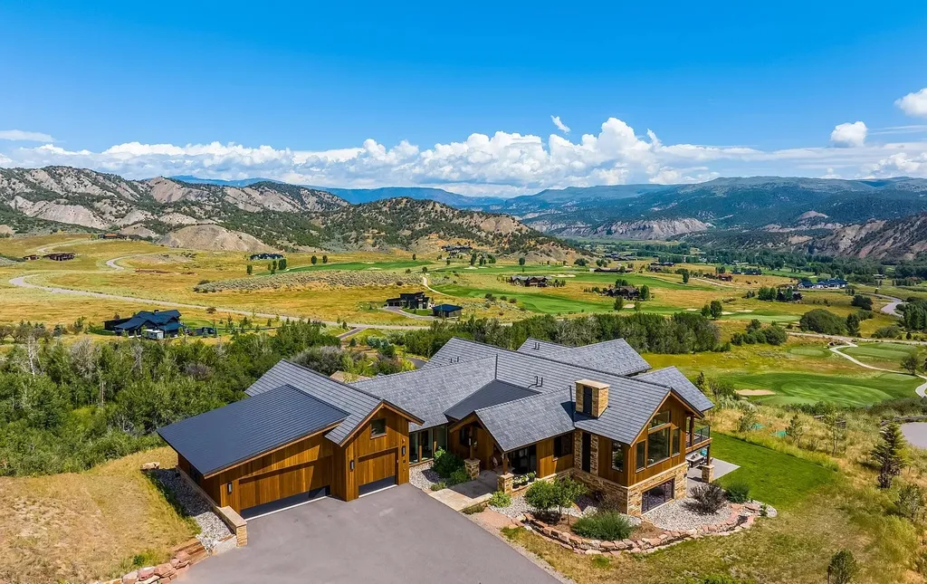 2445 Frost Creek Drive Home in Eagle, Colorado. Discover the epitome of elegant mountain living in this custom-designed Frost Creek home. Perched on the highest point, this exquisite residence offers 360-degree views of the private Club of Frost Creek and Brush Creek Valley.