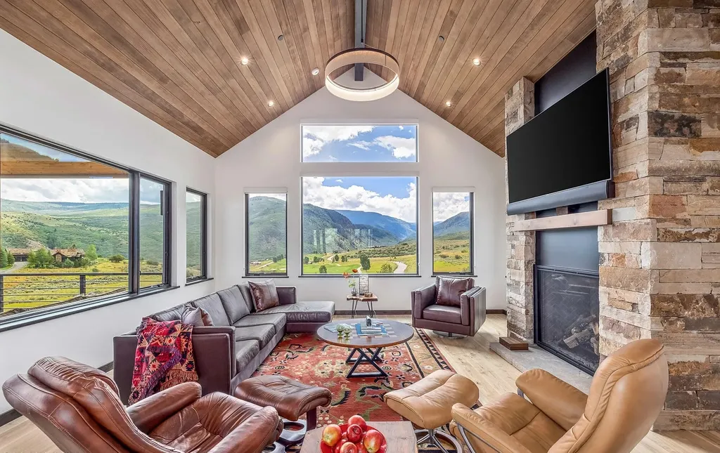 2445 Frost Creek Drive Home in Eagle, Colorado. Discover the epitome of elegant mountain living in this custom-designed Frost Creek home. Perched on the highest point, this exquisite residence offers 360-degree views of the private Club of Frost Creek and Brush Creek Valley.