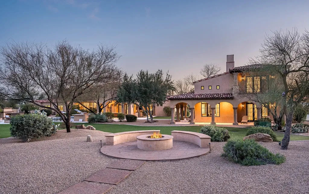 24546 North 91st Street Home in Scottsdale, Arizona. Discover the epitome of modern luxury at this renovated Modern Spanish estate in Prado Estates. Crafted by Mike Graham of American First Builders, the property showcases sweeping mountain and city views across its rare 4.7-acre lot.